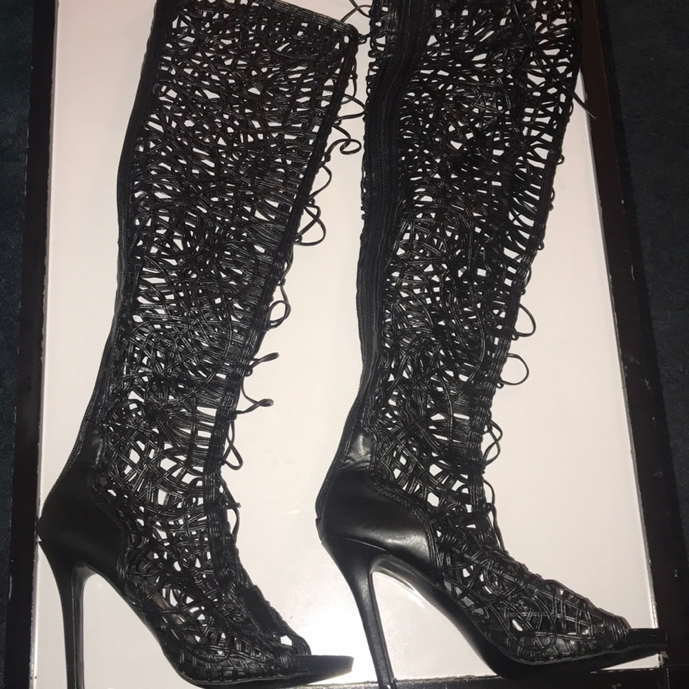 Tall black detailed lace up heels